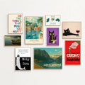 Custom print-on-demand wall art posters in natural wood frames displayed as a gallery wall with varied art styles